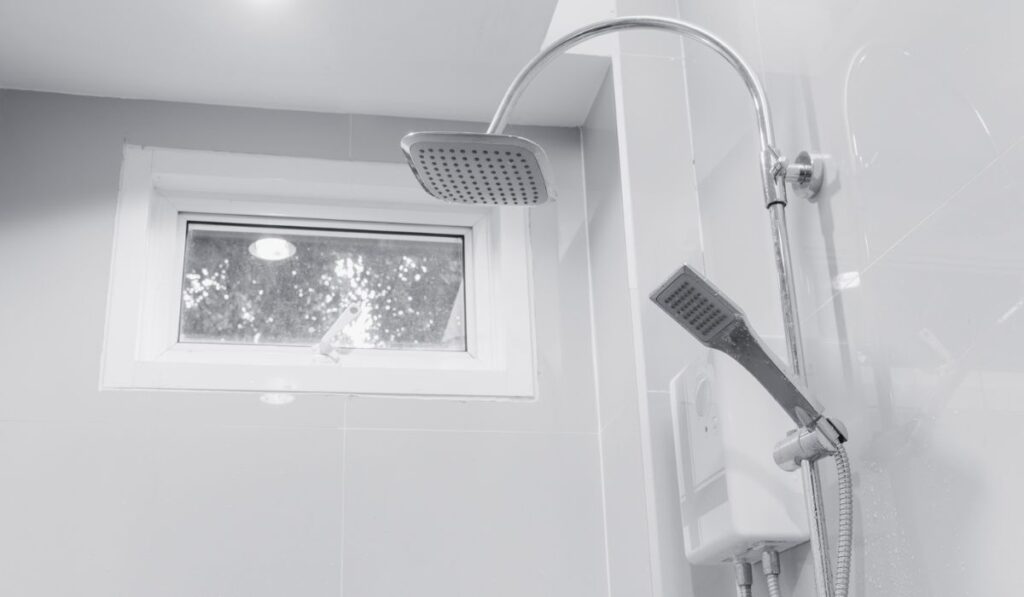 Clean new the bathroom shower head with awning windows